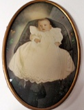 A Vintage Oval Babies Portrait