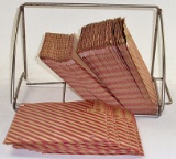 Metal rack with 100 paper folders to store 45's