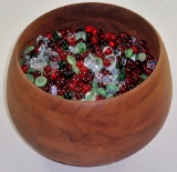 A Large Dansk Wooden Bowl full of colored glass