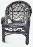 A Child's Woven Wicker Armchair