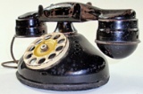 A Toy Pressed Tin Telephone.
