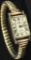 Lady's Baume & Mercier Geneve Watch & Elasto-Fixo Band marked 14K - 6 Jewels. Approx 21.8 grams.