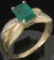 Ring marked 14K with green & clear stones. Approx 3.6 grams.