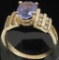 Ring marked 14K with blue & clear stones. Approx 3.0 grams.