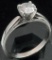 Ring marked 14K with clear stone. Approx 1.9 grams.