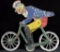 A.C. Gilberts & Co. - Uncle Sam on Bicycle String Balance Toy.