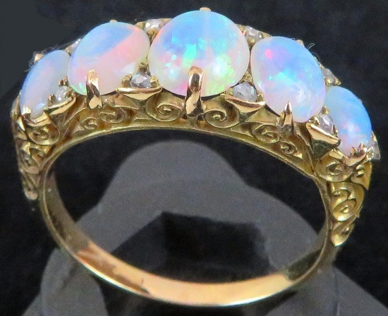 Antique 18K yellow gold Ring with (5) Opals & (10) diamond chips. Approx 4.6 grams.