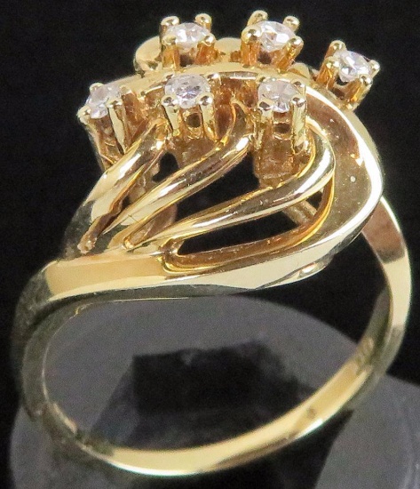 Ring marked 14K with (6) diamonds. Approx 5.1 grams.