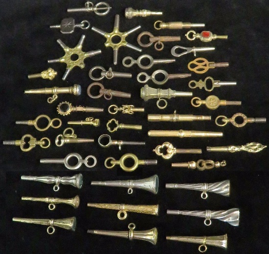 Over (2) dozen antique Watch Keys.