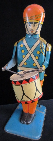 Wolverine Supply & Mfg. Tin Litho No. 27 "Drum Major". approx 13".