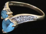 Ring marked 14K with blue & clear stones. Approx 2.8 grams.