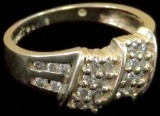 Ring marked 14K with clear stones. Approx 3.7 grams.