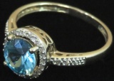 Ring tests 14K with blue & clear stones. Approx 2.6 grams.