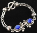 Sterling Silver Bracelet with blue stones. Approx 49.8 grams.