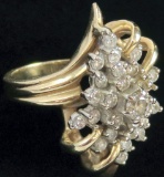 Ring marked 14K with (27) diamonds. Approx 8.0 grams.
