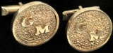 Pair of Cufflinks marked 14K yellow gold with initials GM. Approx 22.8 grams.