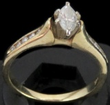 Ring marked 14K with (11) diamonds. Approx 3.2 grams.