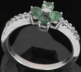 Ring marked 14K with green & clear stones. Approx 3.5 grams.