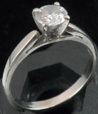 Ring marked 14K with clear stone. Approx 1.9 grams.