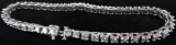 14K Tennis Bracelet with (44) diamonds approx 5ct. total weight. Approx 12.0 grams.