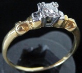 Ring marked 14K with clear stone. Approx 2.5 grams.