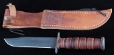 Case XX U.S. Marine Corps Fixed Blade Combat Knife with leather handle & sheath.