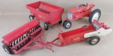 Over a dozen vintage Tru Scale Farm Equipment Toys. Som missing parts. Nice variety!