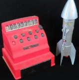 Lot of (2) vintage items includes Astro Mfg. Rocket Bank - The City National Bank in Dixon, Illinois