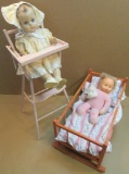 Lot of (2) vintage Dolls (1) in high chair & (1) in baby crib.