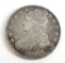 1833 Capped Bust Half Dollar. filled hole.