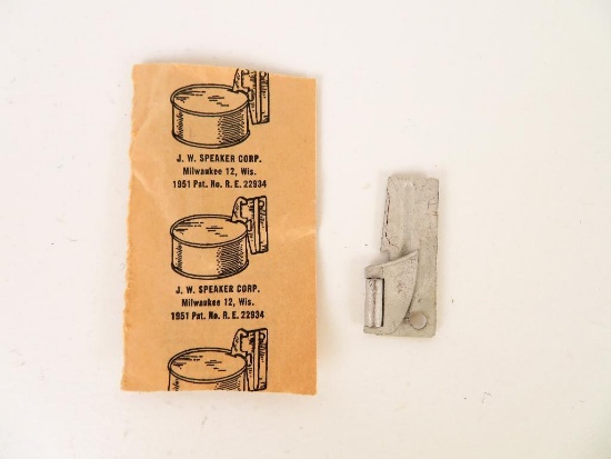 WWII Can Opener in original paper holder.