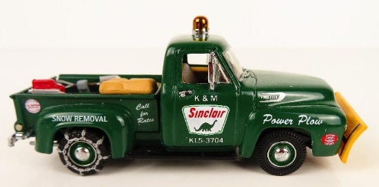 toy pickup truck with snow plow