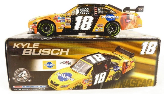 Kyle Busch #18 Autographed 1/24 Scale Stock Car Pedigree Action Racing in original box.