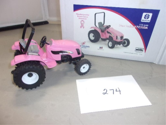 TOY TRACTOR SCALE MODELS 1/16 NEW HOLLAND TC33DA