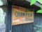 Champion Single Sided Painted Tin Sign