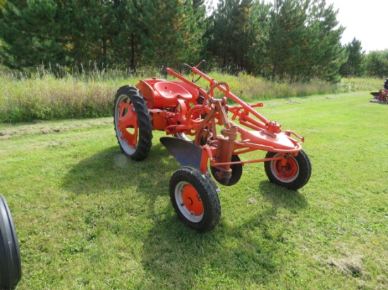 Allis Chalmers G Tractor with single bottom plow