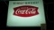 Lighted Coca Cola sign