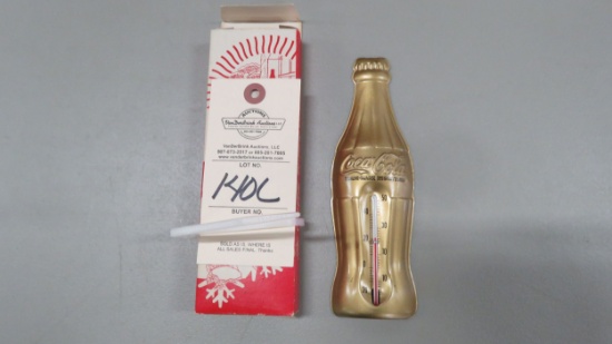 Gold coca cola thermometer 7 inches tall