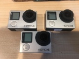 Box of 3 GoPro Hero 4 Cameras and Misc. Accessories