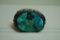 Turquoise belt buckle.