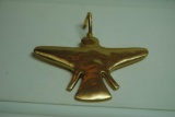 Gold bird pendant.
