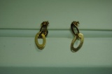 Gold link dangle earrings.