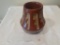 Redware Pot with painted stair step pattern in blue with red trim