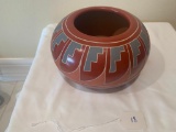 Redware Pot with stair step incised pattern around the rim with cream slip
