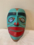 Wooden mask painted mostly turquoise ? Shaman Spirit Mask