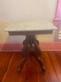 Carved Wood table with marble top. Crack in marble top