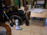 Misc. lot of medical equipment: Ki wheelchair, Drive wheelchair (new), boot, Medlin walker w/seat