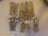 Silver plated flatware: 12 dinner forks, 12 salad fork, 12 knifes, 12 teaspoons, 9 butter spreaders