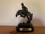 Bronze outlaw by Remington (Missing pin on plaque)