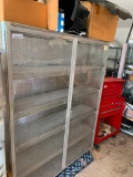 Glass front storage cabinet with contents